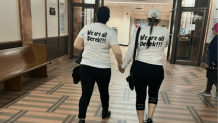 Supporters wore T-shirts that read "We are all Derek" at a court hearing held for the 13-year old charged in his mother's stabbing murder.  