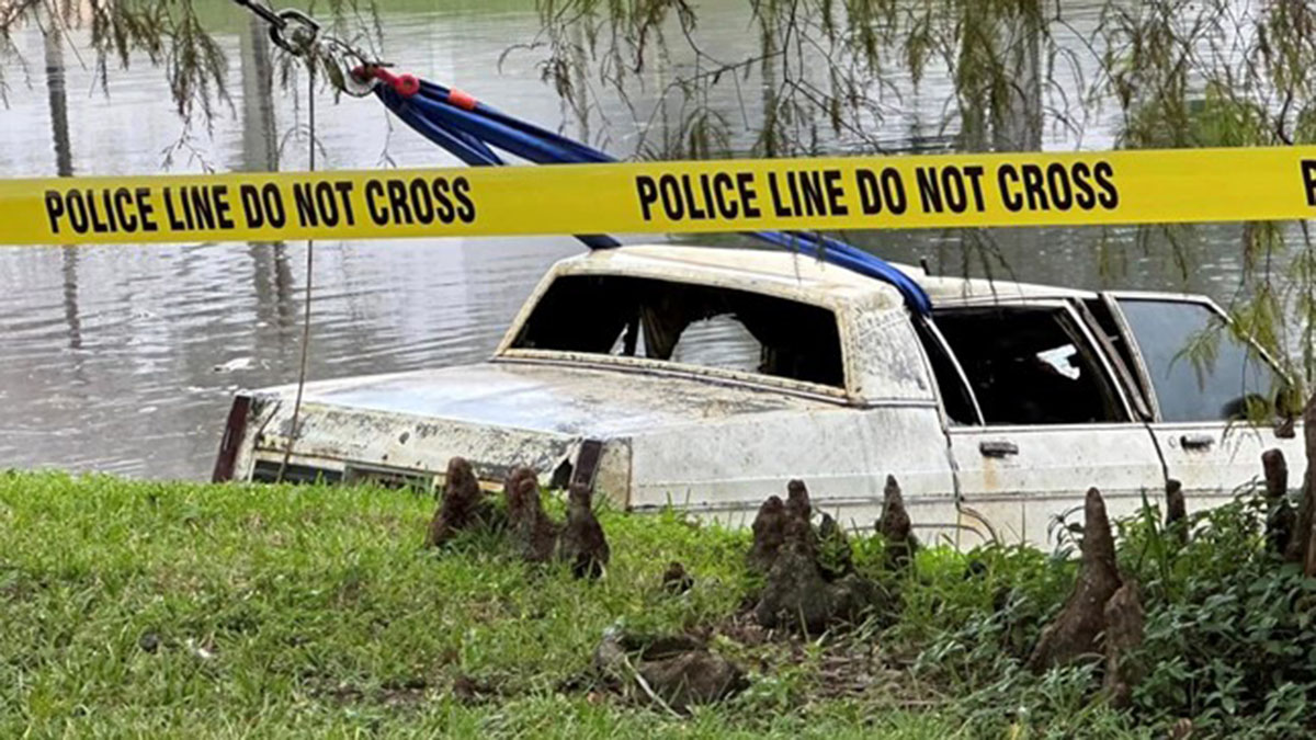 Human remains discovered inside car found submerged in lake at