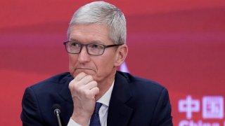 Apple CEO Tim Cook attends the annual session of China Development Forum (CDF) 2018 at the Diaoyutai State Guesthouse in Beijing, China March 26, 2018.