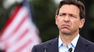 Republican presidential candidate Florida Gov. Ron DeSantis stands at a campaign event at the Los Angeles Harbor Grain Terminal on September 29, 2023 in Long Beach, California.