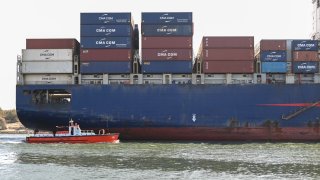 A ship transits the Suez Canal towards the Red Sea on January 10, 2024 in Ismailia, Egypt. 