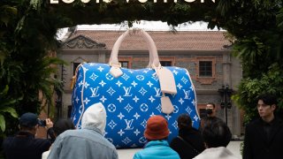 A view of a scaled-up mock of a Louis Vuitton bag during a promotional event by the French luxury brand in Shanghai on Dec. 4, 2023.