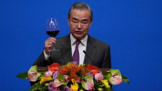 Chinese Foreign Minister Wang Yi gives a toast