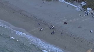 A woman who jumped into the ocean off Fort Lauderdale while on a personal watercraft was pulled from the water and rushed to a local hospital.