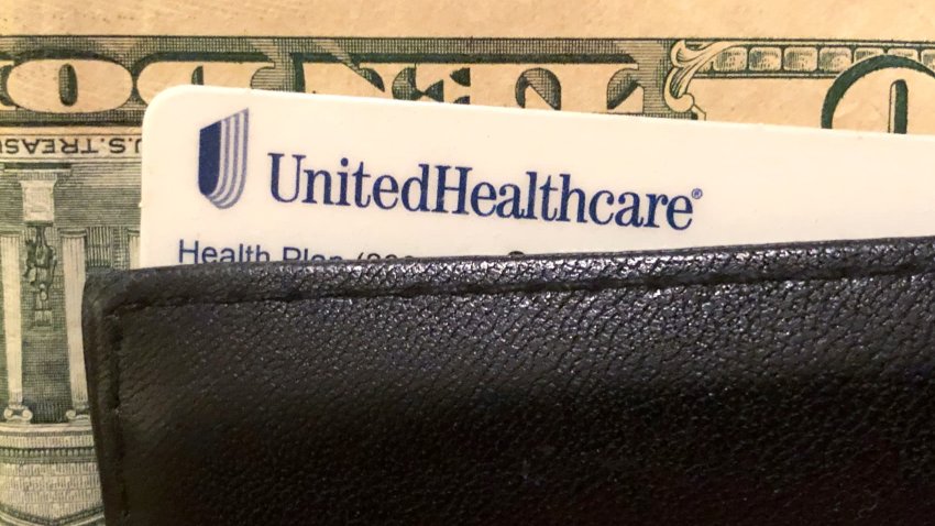 A UnitedHealth Group health insurance card is seen in a wallet, Oct.14, 2019.