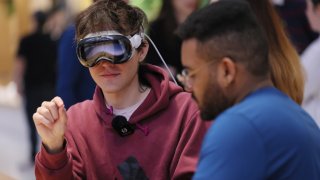 People experience a demo of the Apple Vision Pro headset at the Fifth Avenue Apple store on February 02, 2024 in New York City.