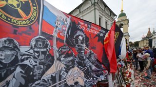MOSCOW, Oct. 1, 2023: People visit a makeshift memorial for Wagner private mercenary group chief Yevgeny Prigozhin in central Moscow on October 1, 2023, to mark 40 days since his death as per Orthodox tradition.