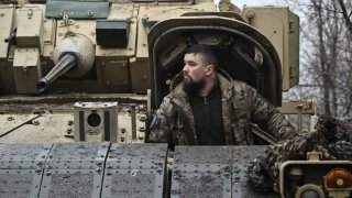 A Ukrainian serviceman of the 47th Mechanized Brigade prepares for combat a Bradley fighting vehicle, not far away from Avdiivka, Donetsk region on February 11, 2024, amid the Russian invasion of Ukraine.