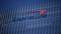 Capital One's acquisition has $1.4 billion breakup fee if rival bid emerges, but none if regulators kill deal