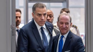 Hunter Biden, left, son of President Joe Biden, arrives with attorney Abbe Lowell at the O’Neill House Office Building for a closed-door deposition in a Republican-led investigation into the Biden family, on Capitol Hill in Washington, Wednesday, Feb. 28, 2024.