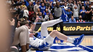 Duke’s Kyle Filipowski sprains ankle as Wake Forest fans storm court ...