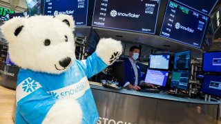 The New York Stock Exchange welcomes Snowflake to usher in the first day of winter on Dec. 21, 2021. To honor the occasion, Snowflake the Bear, joined by Chris Taylor, vice president of NYSE Listings and Services, rings the opening bell.