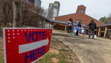 CHARLOTTE, NORTH CAROLINA - MARCH 5: A person enters to vote on Super Tuesday at First Ward Creative Academy, Mecklenburg County Precinct 13 on March 5, 2024 in Charlotte, North Carolina. 15 States and one U.S. Territory hold their primary elections on Super Tuesday, awarding more delegates than any other day in the presidential nominating calendar.  (Photo by Grant Baldwin/Getty Images)