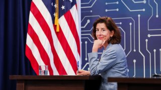WASHINGTON, DC – JULY 25: U.S. Secretary of Commerce Gina Raimondo listens as U.S. President Joe Biden participates virtually in a meeting on the Creating Helpful Incentives to Produce Semiconductors (CHIPS) for America Act, in the South Court Auditorium at the White House on July 25, 2022 in Washington, DC.