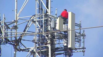 Man climbs cell tower in Miami