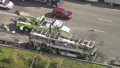 Tour bus goes up in flames on I-595, causes major traffic delays