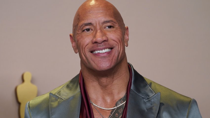 FILE – Dwayne “The Rock” Johnson poses in the press room at the Oscars on March 10, 2024, in Los Angeles. Johnson will appear at this year’s Wrestlemania in Philadelphia on April 6 and 7.