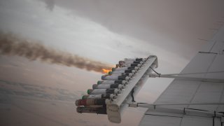 Hygroscopic (water-attracting) salt flares released below a cloud during a routine cloud-seeding mission on January 31, 2024 in Al Ain, United Arab Emirates. Cloud seeding is a weather modification technique that employs chemicals to stimulate the formation of ice crystals or raindrops within clouds. Although cloud seeding has been in use since 1947, its significance has grown, particularly for arid regions like the UAE. The country, with its own National Center of Meteorology and Seismology deploying planes for cloud seeding, has invested in the technology as an immediate solution to address challenges related to water scarcity.
(Photo by Andrea DiCenzo/Getty Images)
