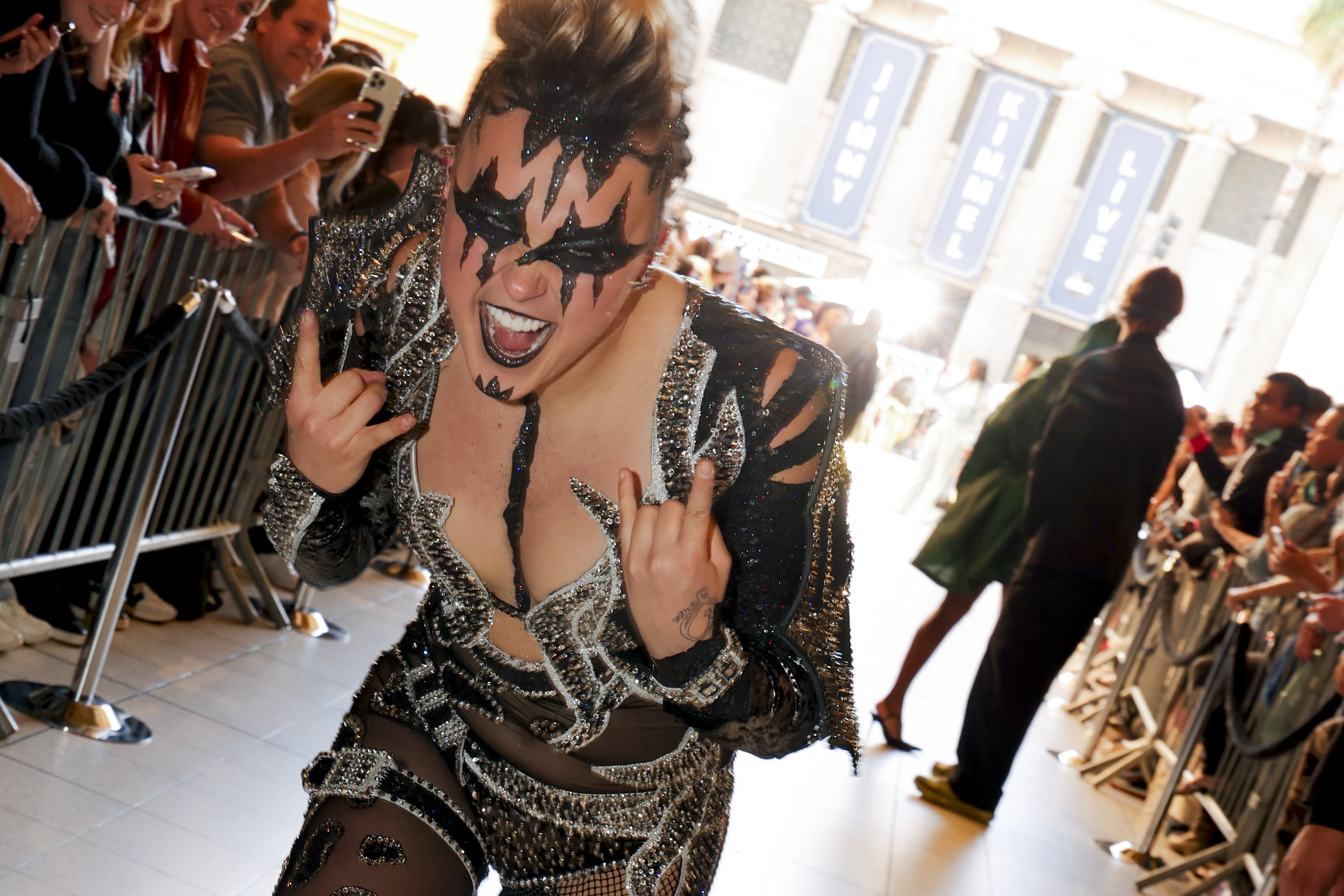 JoJo Siwa pushes back on criticism of her grownup era whilst debuting dramatic all-black seem