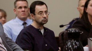 FILE - Larry Nassar sits during his sentencing hearing, Jan. 24, 2018, in Lansing, Mich.