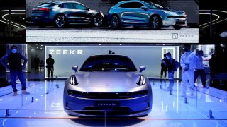 A Zeekr 001 electric vehicle (EV) by Geely is seen displayed at the Zeekr booth during a media day for the Auto Shanghai show in Shanghai, China April 19, 2021.