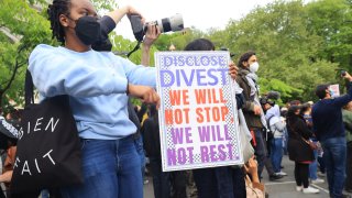 Students and faculty members march after New York Police Department (NYPD) officers arrest students at New York University (NYU) and The New School who are demanding universities divest from Israel. One pro-Palestinian detained by the police during the march.