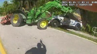 Bodycam shows Key West Police open fire after cruiser hit by loader