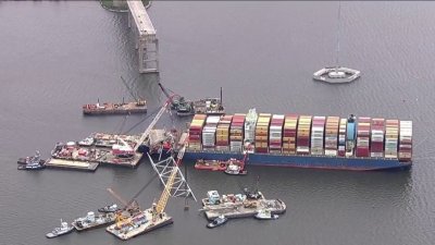 Crews prepare to move cargo ship that toppled Key Bridge