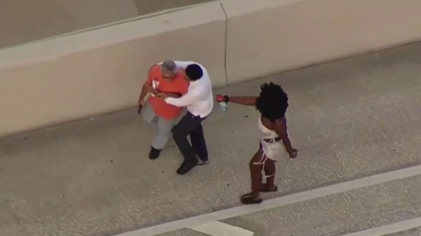 Intense video shows attempted stabbing after crash on I-395