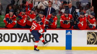 SUNRISE, FL – APRIL 29: Teammates congratulate Evan Rodrigues #17 of the Florida Panthers after he scored a third period goal against the Tampa Bay Lightning in Game Five of the First Round of the 2024 Stanley Cup Playoffs at the Amerant Bank Arena on April 29, 2024 in Sunrise, Florida. (Photo by Joel Auerbach/Getty Images)