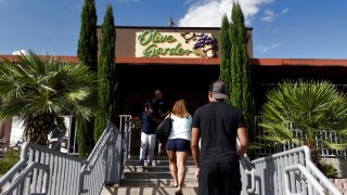 Customers arrive at an Olive Garden location in San Antonio, Texas.