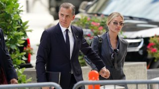 Hunter Biden, son of U.S. President Joe Biden, arrives at the federal court with his wife Melissa Cohen Biden, on the opening day of his trial on criminal gun charges in Wilmington, Delaware, on June 3, 2024.