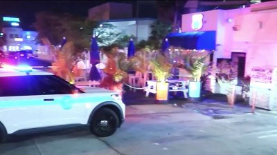 Search continues for armed suspects who robbed Miami store