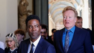 Chris Rock, left, and Conan O’Brien arrive for an audience with Pope Francis in the Clementine Hall at The Vatican, Friday, June 14, 2024.