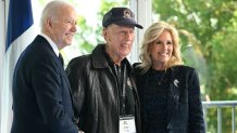 President Joe Biden and first lady Jill Biden pose for a photograph with US WWII veteran James "Jim" Kunkle during the US ceremony marking the 80th anniversary of the World War II "D-Day" Allied landings in Normandy, at the Normandy American Cemetery and Memorial in Colleville-sur-Mer.