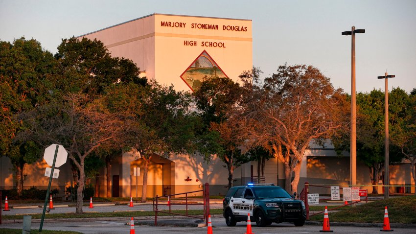 A general view of Marjory Stoneman Douglas High School as staff and teachers prepare for the return of students in Parkland, Florida on February 27, 2018.
Florida’s Marjory Stoneman Douglas high school will reopen on February 28, 2018 two weeks after 17 people were killed in a shooting by former student, Nikolas Cruz, leaving 17 people dead and 15 injured on February 14, 2018. / AFP PHOTO / RHONA WISE        (Photo credit should read RHONA WISE/AFP via Getty Images)