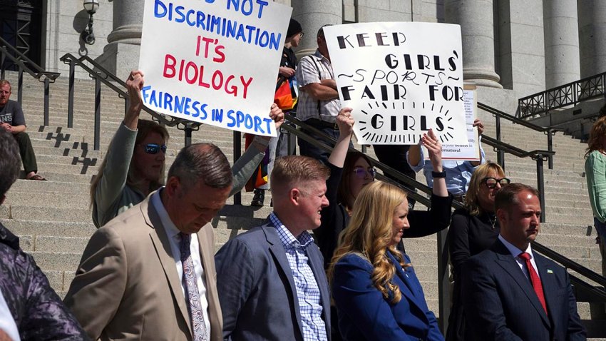 FILE - Lawmakers listen as parents speak about the prospect of their children competing against transgender girls in school sports at the Utah State Capitol on March 25, 2022, in Salt Lake City.