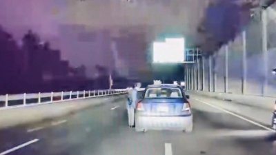 WATCH: Suspected drunk driver hits trooper during traffic stop