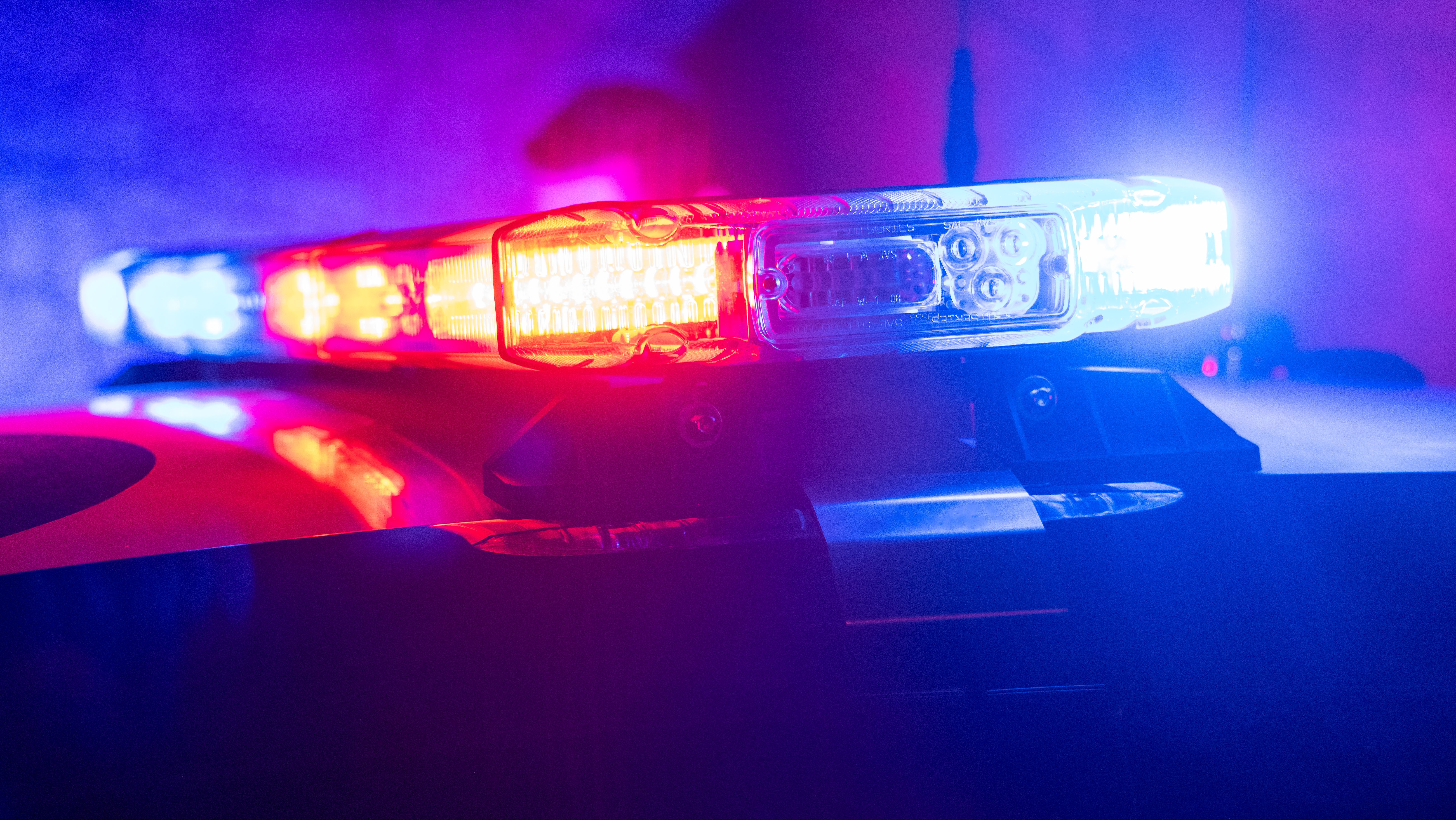 Police Car with Flashing red and blue lights