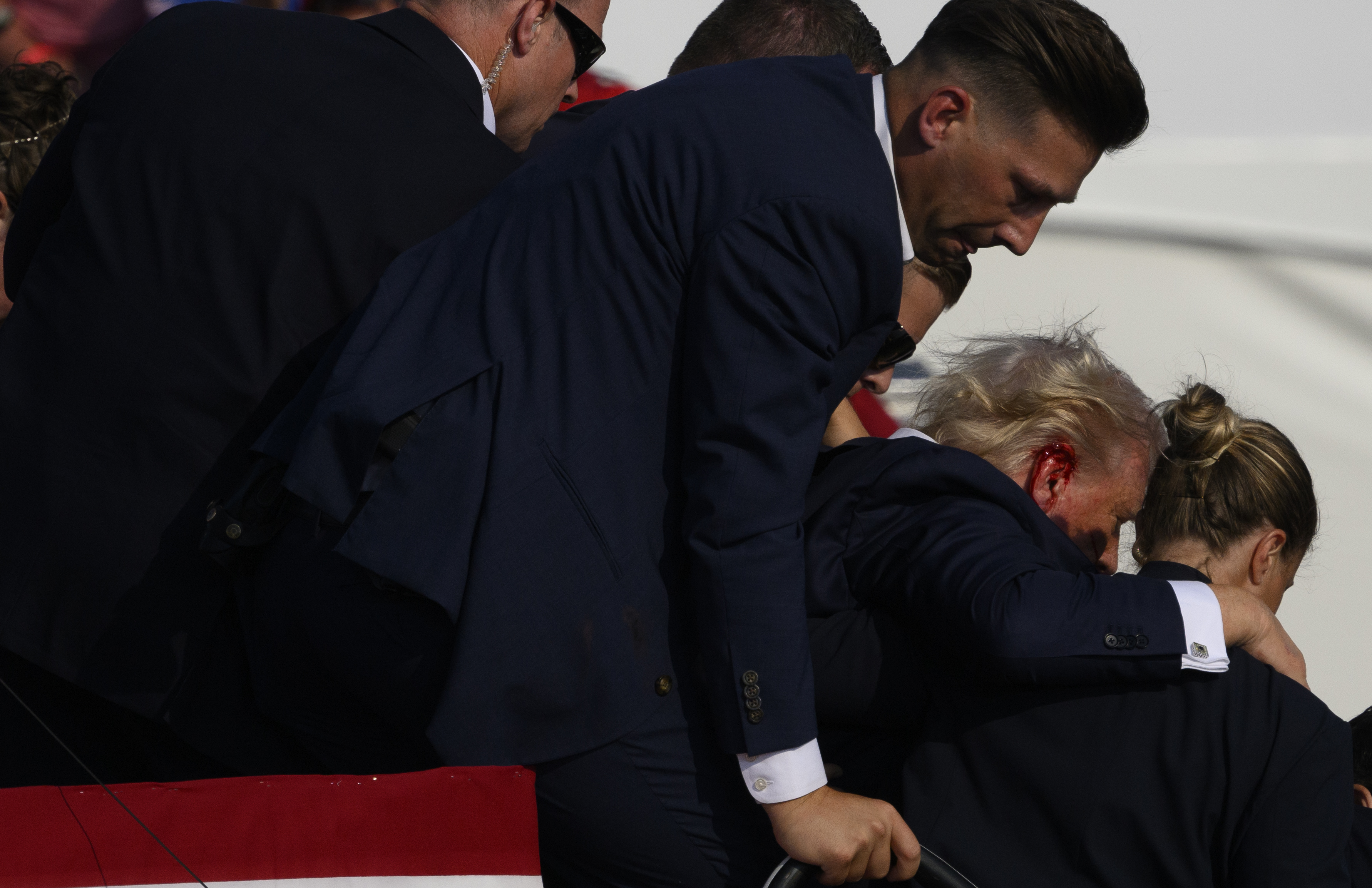 Photos: Former President Donald Trump injured in shooting at rally ...