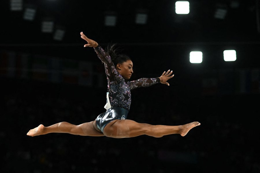 US' Simone Biles competes in the balance beam event of the artistic gymnastics women's qualification