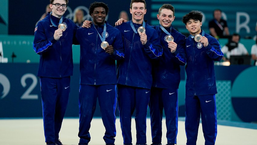 PARIS, FRANCE – JULY 29: (L-R) Stephen Nedoroscik of United States, Frederick Richard of United States, Brody Malone of United States, Paul Juda of United States, Asher Hong of United States pose for a photo with their bronze medals during the Men’s Artistic Gymnastics Team Final on day three of the Olympic Games Paris 2024 at Bercy Arena on July 29, 2024 in Paris, France.