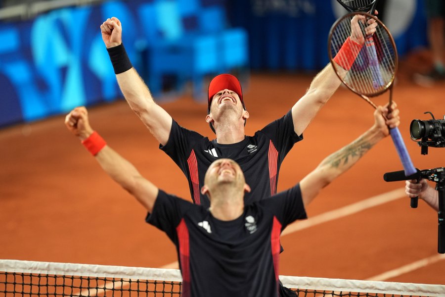 Great Britain's Andy Murray and Dan Evans celebrate after winning