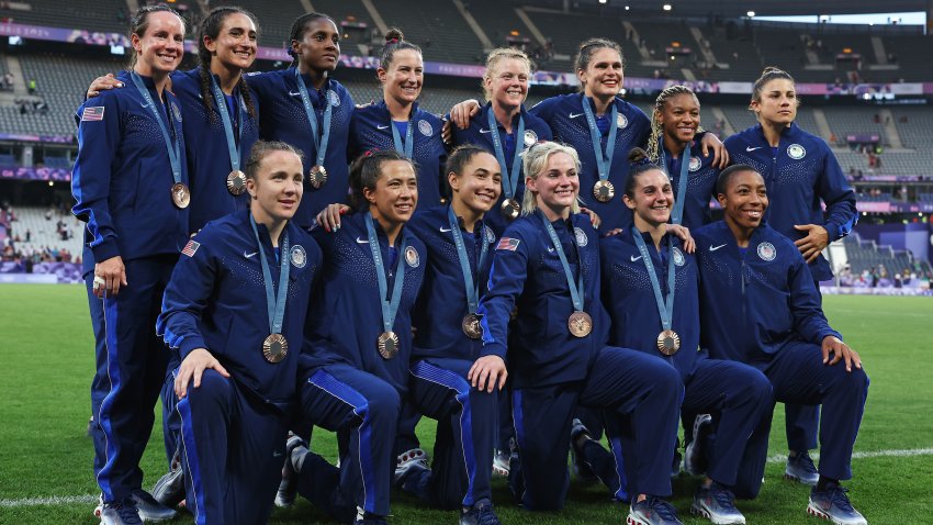 PARIS, FRANCE – JULY 30: Bronze medalists of Team United States pose after the Women’s Rugby Sevens medal ceremony following the Women’s Rugby Sevens matches on day four of the Olympic Games Paris 2024 at Stade de France on July 30, 2024 in Paris, France. (Photo by Michael Steele/Getty Images)