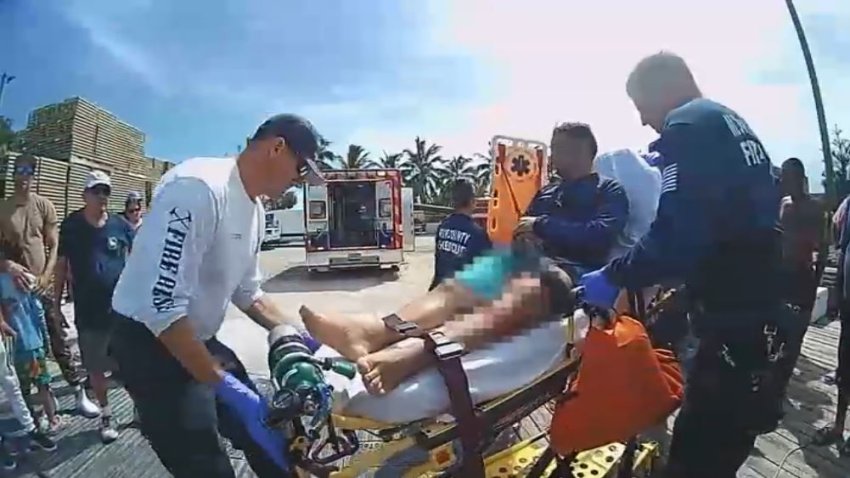 WATCH: Bodyworn video shows spearfisherman rescued after shark bite