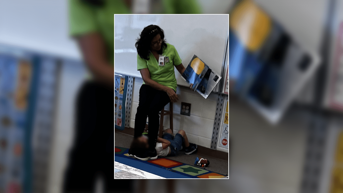 Florida teacher arrested after photo shows her putting student with ...