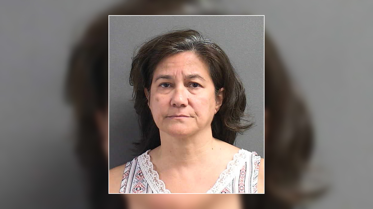 Florida teacher arrested after photo shows her putting student with ...