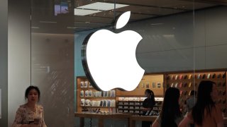 Customers are trying on and learning about Apple Vision Pro headsets at an Apple store in Shanghai, China, on July 22, 2024.