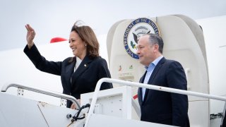 U.S. Vice President Kamala Harris and second gentleman Douglas Emhoff descend from Air Force Two in Wilmington, DE, U.S.,  July 22, 2024. 