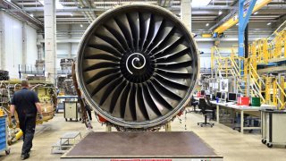 A Rolls-Royce Trent 700 engine for the Airbus A330 stands in a workshop of N3 Engine Overhaul Services GmbH. The company is a joint venture between Lufthansa Technik AG and Rolls-Royce for the maintenance of aircraft engines.